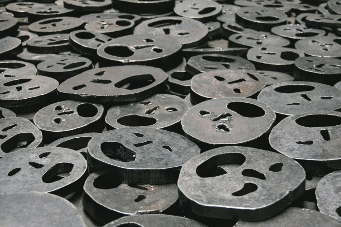 selective focus photography of face ornaments